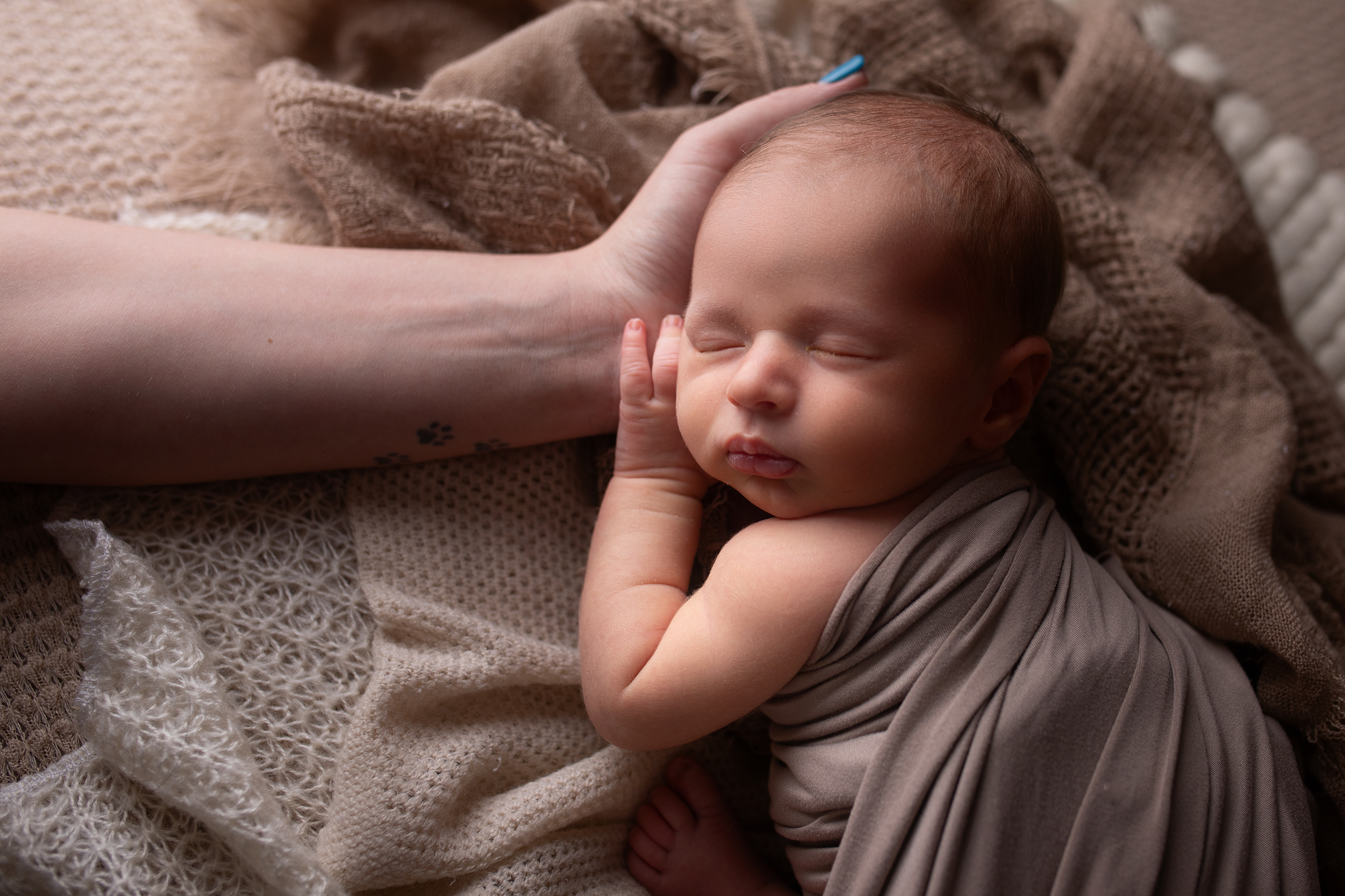 Close-up of baby's tiny hands