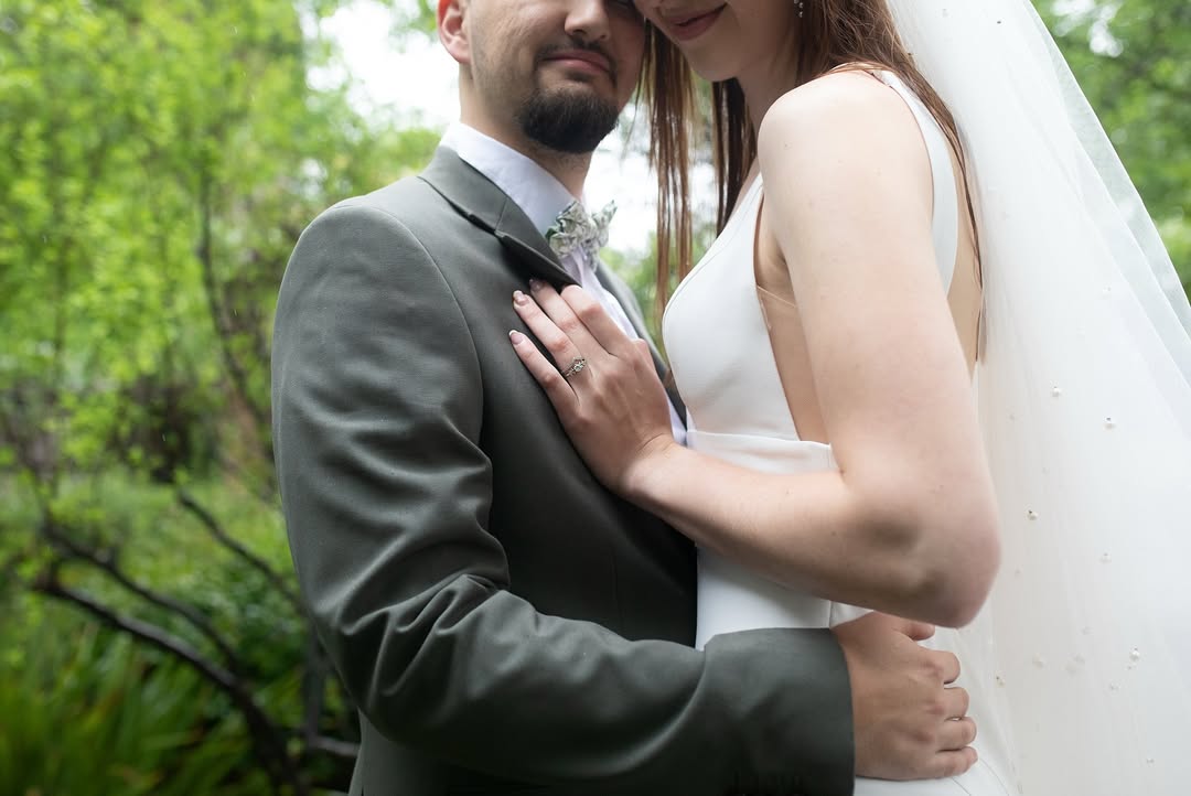 Bride and groom sharing a quiet laugh